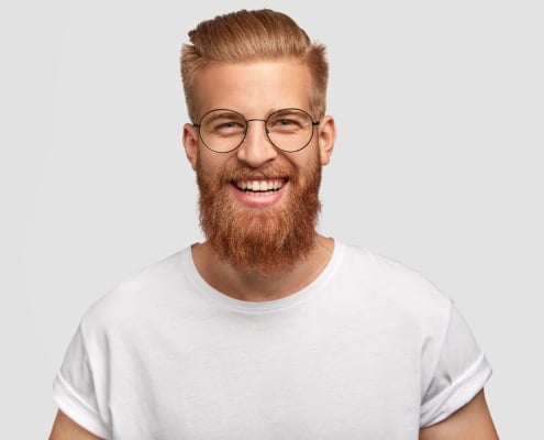 happy-man-with-long-thick-ginger-beard-has-friendly-smile